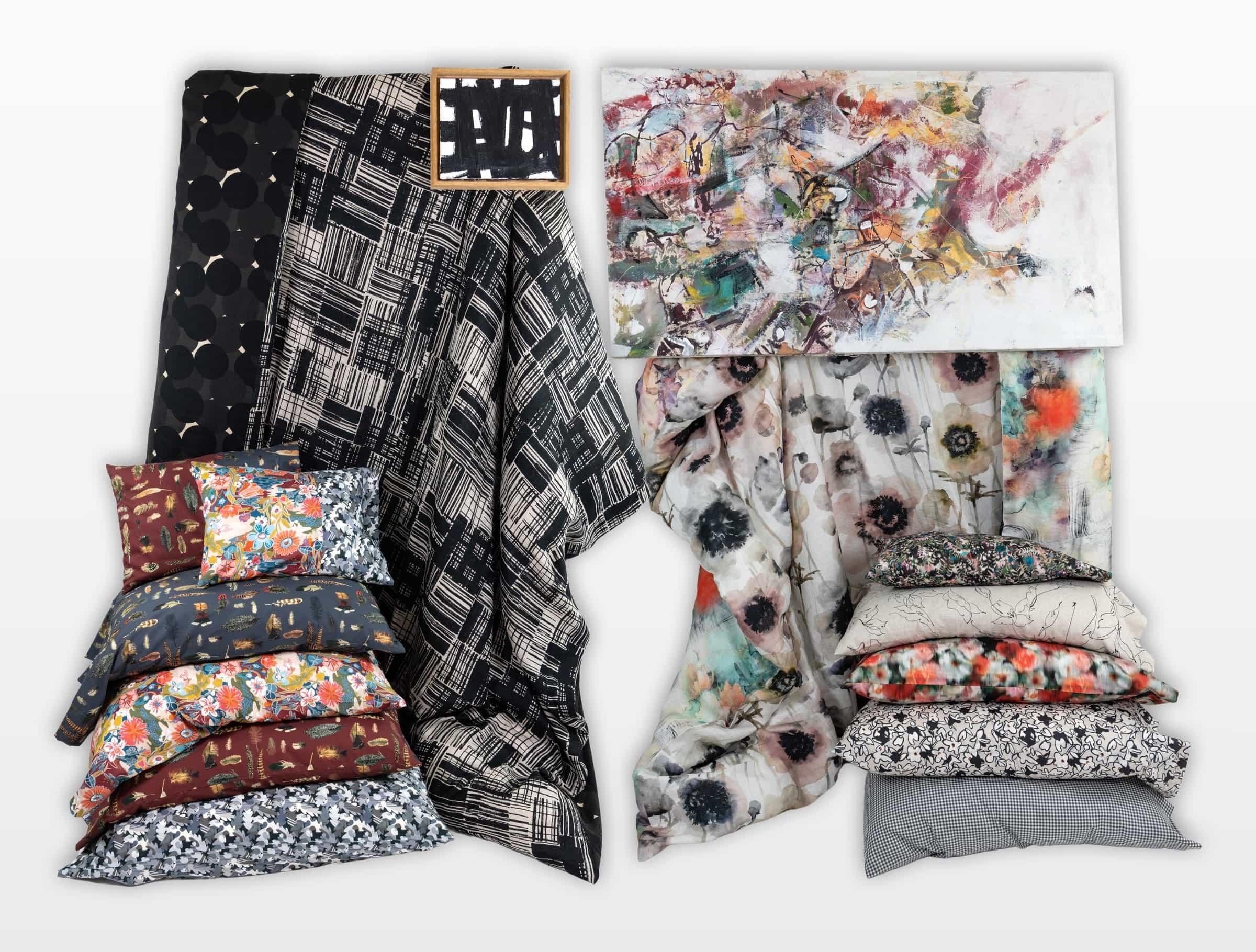 Floral, geometric, and abstract fabric collections with decorative pillows and art, ideal for sewing and home decor