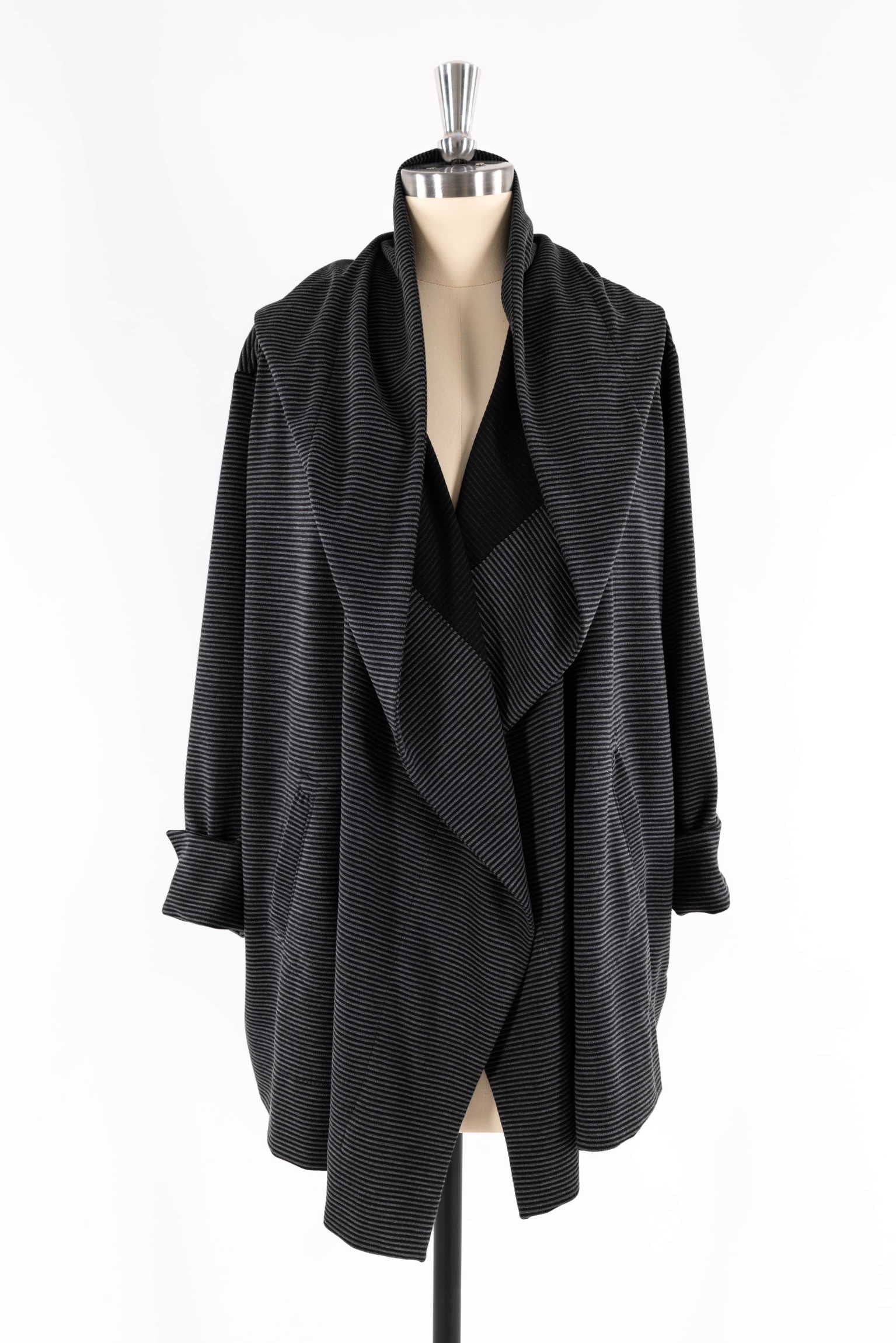 Black striped drape front cardigan on mannequin, ideal for sewing apparel with knit fabric