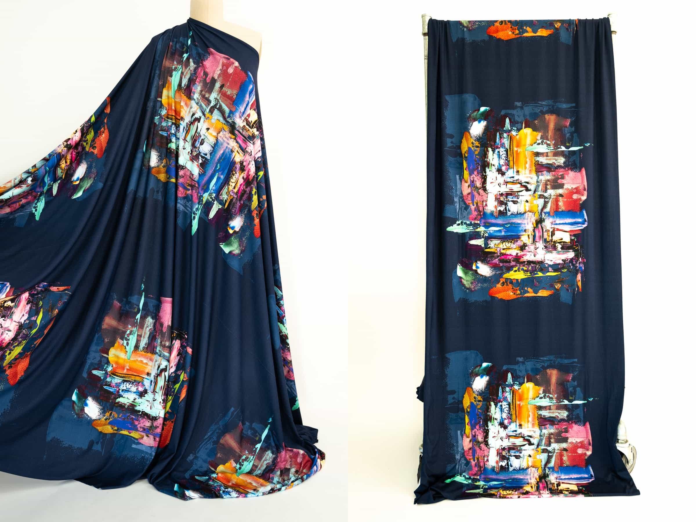 Vibrant abstract print fabric in navy with bold brushstrokes, ideal for fashion apparel and creative sewing projects