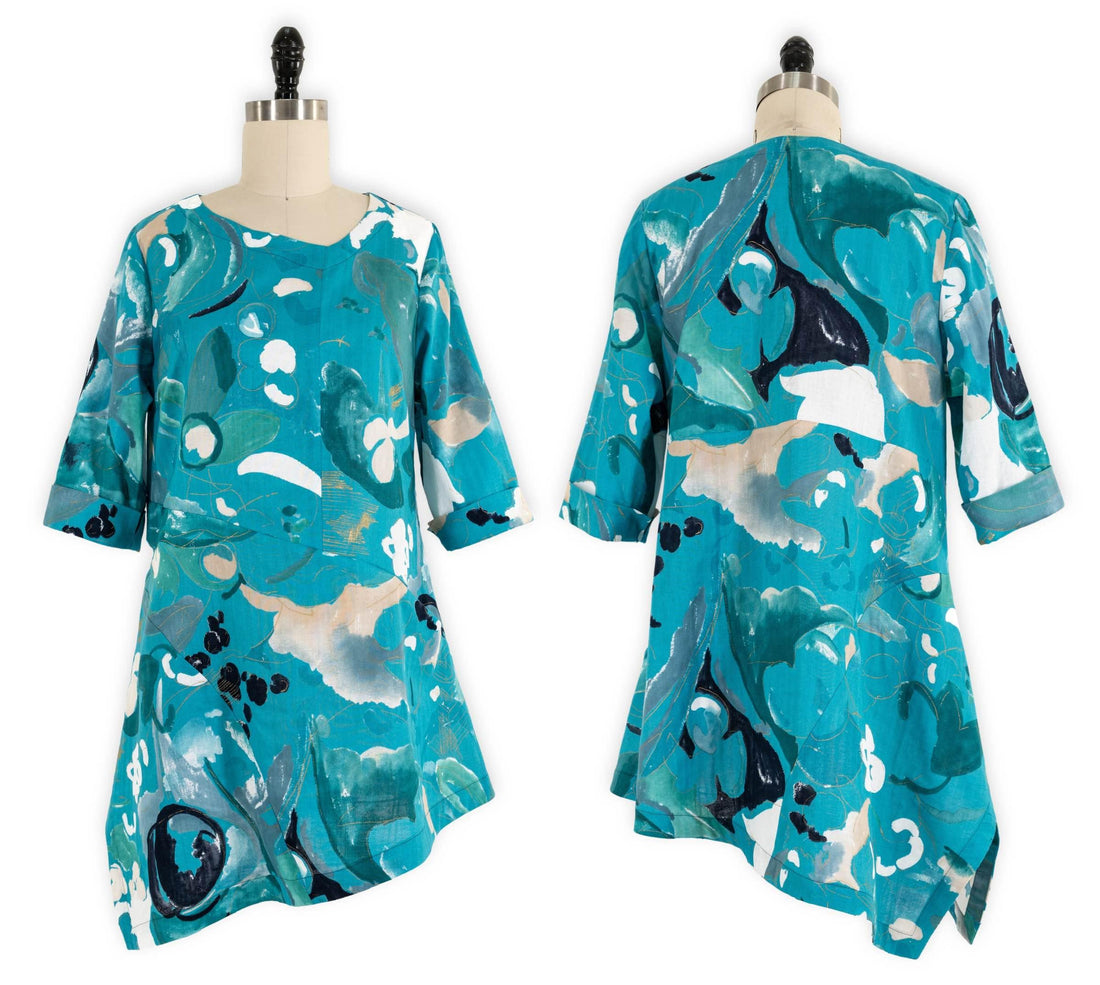 Teal abstract print dress with 3/4 sleeves, front and back views on mannequin for sewing projects