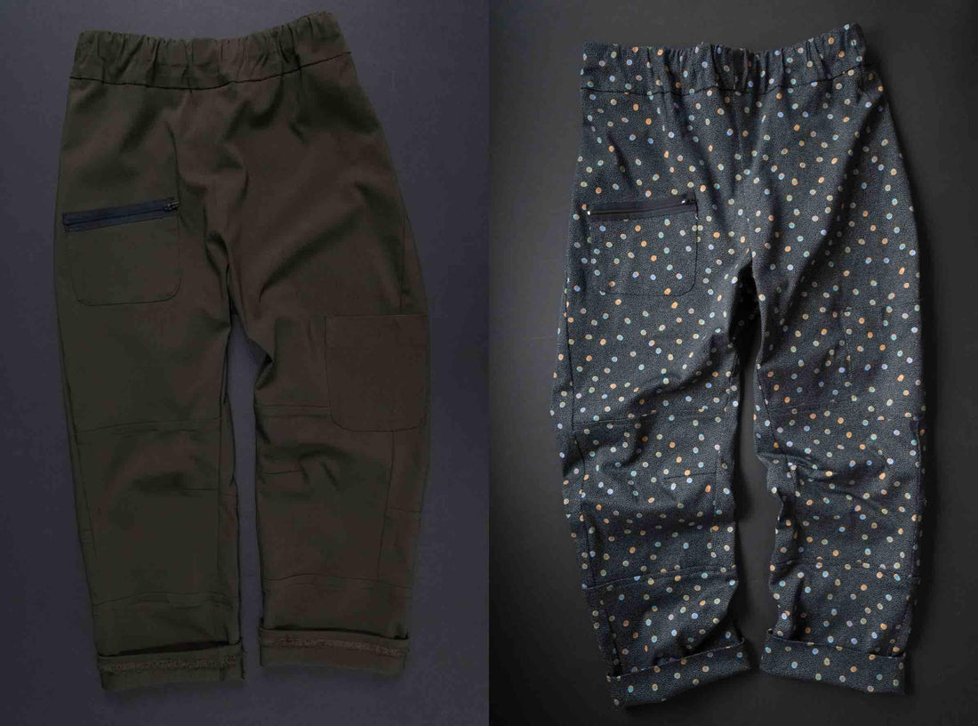 Olive green and polka dot patterned pants with elastic waist and zip pockets, ideal for sewing projects