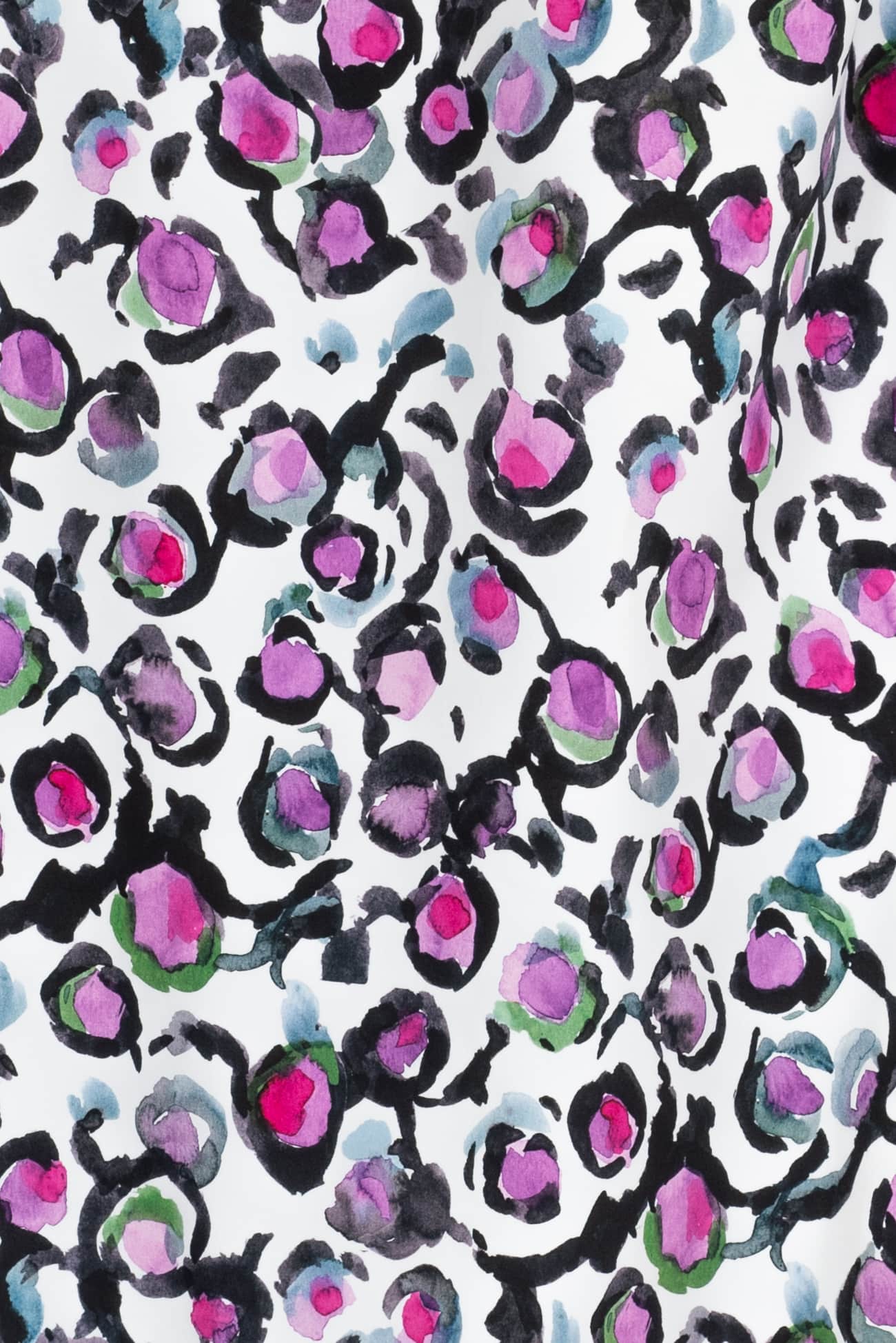Abstract floral print fabric with pink, purple, and black watercolor blooms on white background